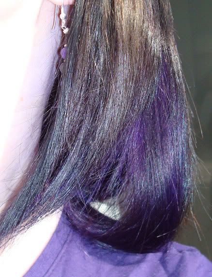 hair with purple underneath. hair with purple underneath.