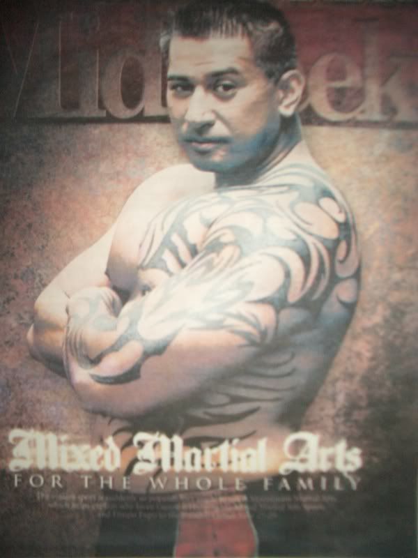  20TH ISSUE-JAVEN FROM HI MMA EXPO RUNNING HARD WITH TRIBAL ARMS TATTOO.
