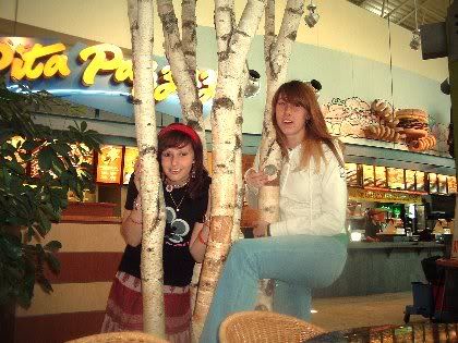 Angela & 
Tessa humping a fake tree.