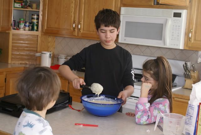 Kids making pancakes