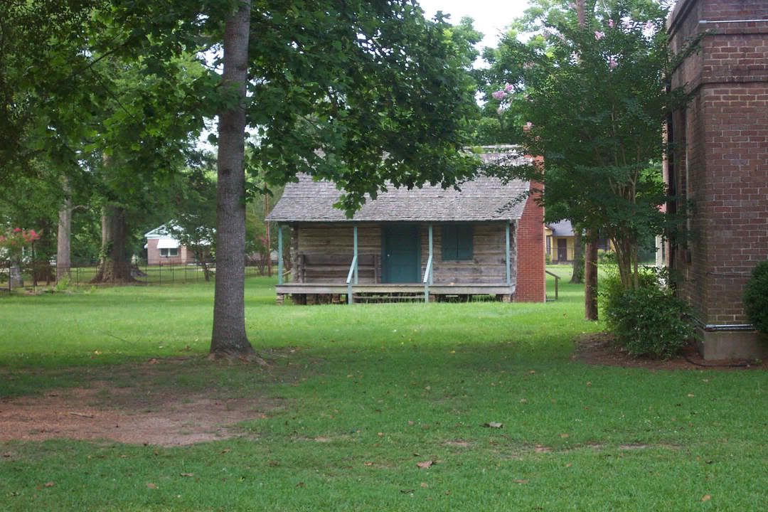The old log Cabin (Behind the old Jail)