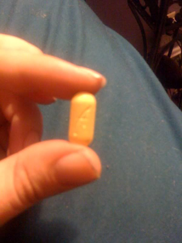 extacy pill identifier. it#39;s a yellow oblong pill,