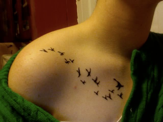  my neck or on my shoulder blade any ideas of cute femenine tattoos