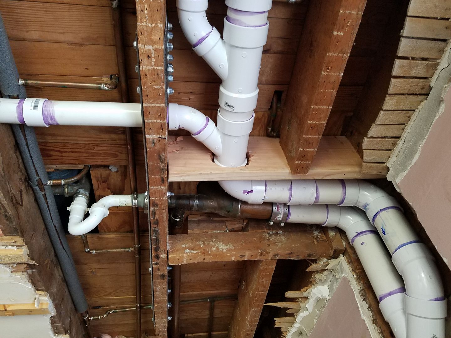 Setting closet flange before floor is done