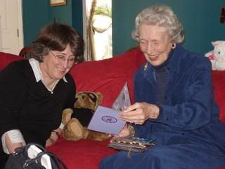 Emily sharing cards with Pauline