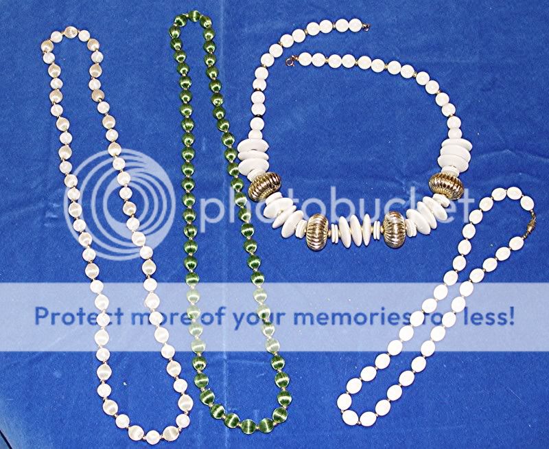   clasp. The beads are glass are some hard plastic. There is some